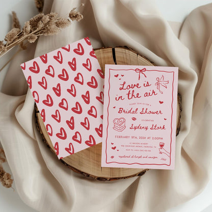 Valentine Bridal Shower Invitation – Pink “Love Is In The Air” Editable Canva Template