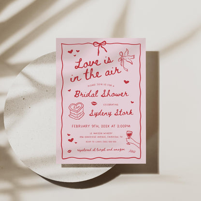 Valentine Bridal Shower Invitation – Pink “Love Is In The Air” Editable Canva Template