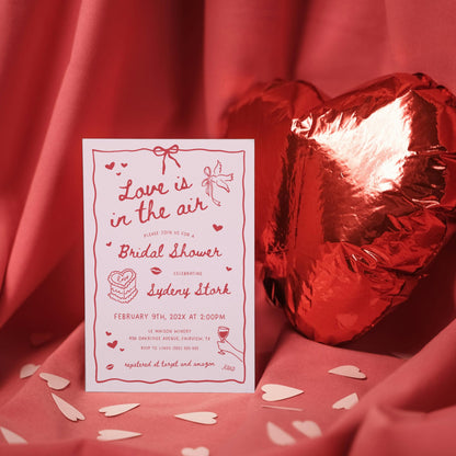 Valentine Bridal Shower Invitation – Pink “Love Is In The Air” Editable Canva Template
